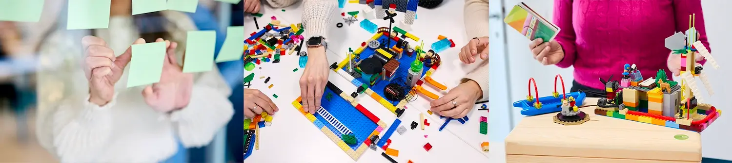 colleghi di lavoro durante team building con i mattoncini LEGO®